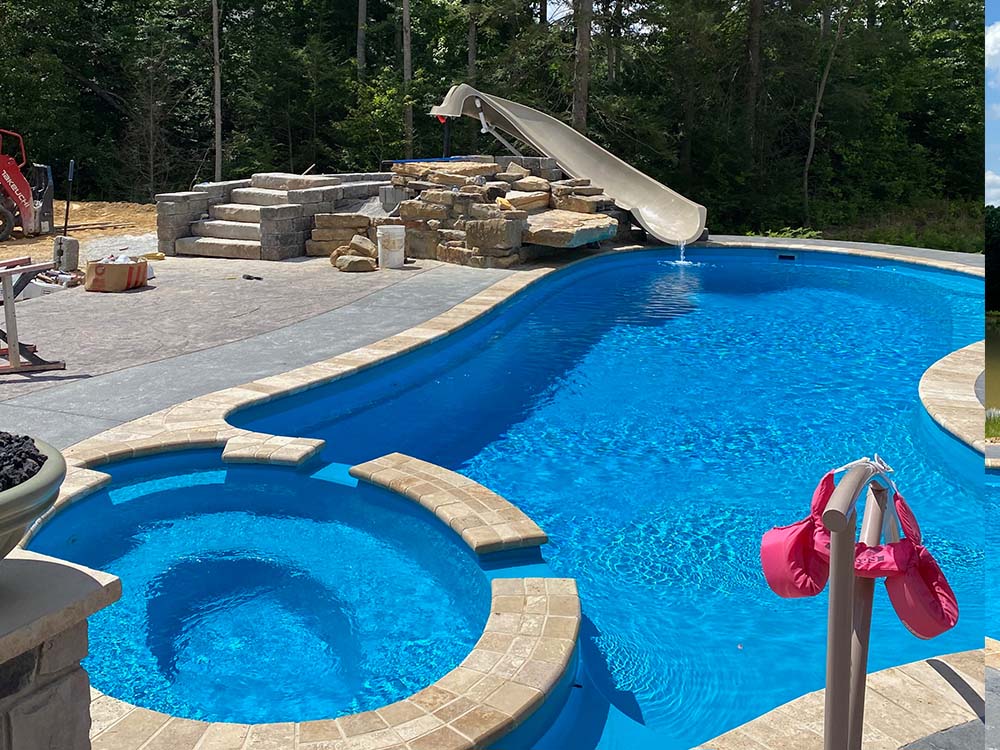 Imagine Pools - Brilliant fiberglass pools with custom rock slide