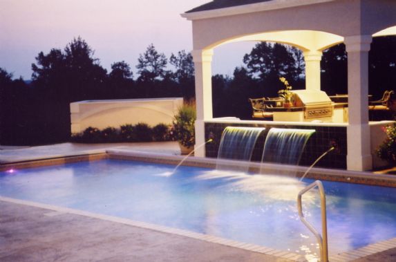 pool with exterior sitting area